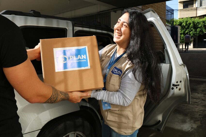 Humanitarian workers in Lebanon deliver aid.